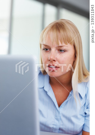 Laptop, reading and business woman in office online working on project, website review and research. Corporate, technology and employee focus on computer for typing email, networking and planning Laptop, reading and business woman in office online working on project, website review and research. Corporate, technology and employee focus on computer for typing email, networking and planning 139311843