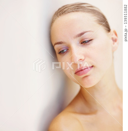 Thinking, beauty and space with a young woman on a wall background for wellness or natural treatment. Relax, skincare and idea with a person at the spa or salon for dermatology or self care on mockup Thinking, beauty and space with a young woman on a wall background for wellness or natural treatment. Relax, skincare and idea with a person at the spa or salon for dermatology or self care on mockup 139311882