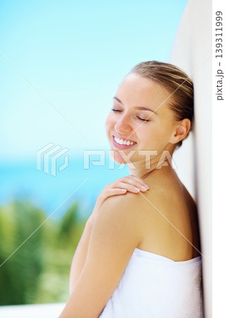 Woman, wall and nature with skincare, health and hands with smile for results by blue sky background. Girl, touch skin and change with cosmetics, wellness and transformation with mockup space outdoor 139311999