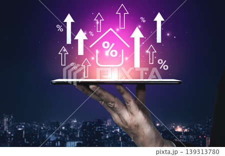 Businessman Holding Tablet with Digital Graphs and Increased Home Percentage Indicators in Vibrant Urban Background at Night Gantry 139313780