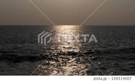 distance ocean sunset reflection on water landscape 139314007