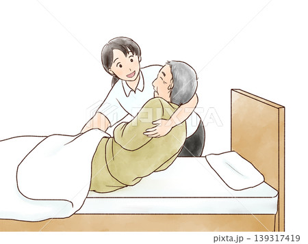 高齢者をベッドで介助する女性介護士 139317419