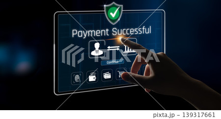 A close-up of a hand interacting with a digital screen displaying a "Payment Successful" message, showcasing modern payment technology and secure transaction processes. Sigmoid A close-up of a hand interacting with a digital screen displaying a "Payment Successful" message, showcasing modern payment technology and secure transaction processes. Sigmoid 139317661