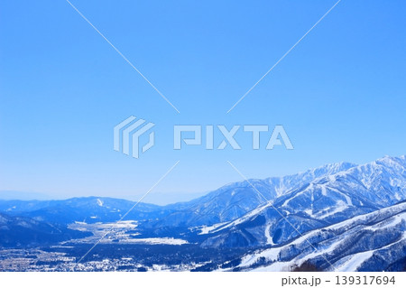 3月の白馬岩岳頂上からの北アルプス　　　信州の山々　　　冠雪の北アルプス 139317694