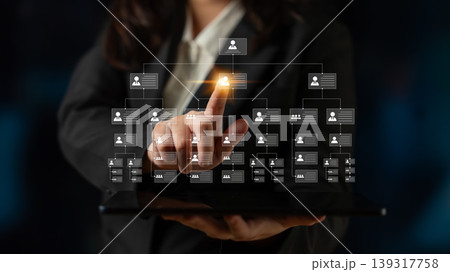Business Professional Interacting with Digital Workflow Chart on Tablet Device in Dark Environment for Technology and Team Collaboration Concepts Ledger Business Professional Interacting with Digital Workflow Chart on Tablet Device in Dark Environment for Technology and Team Collaboration Concepts Ledger 139317758