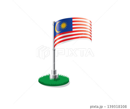 Malaysian flag on a flagpole mounted on the grass Malaysian flag on a flagpole mounted on the grass 139318108