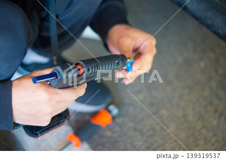 Removing dents on the car. PDR technology. Car body repair without painting. Removing dents on the car. PDR technology. Car body repair without painting. 139319537