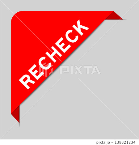 Red color of corner label banner with word recheck on gray background 139321234