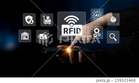 Hand touching smartphone screen with RFID technology icons in background illustrating digital transformation in logistics and inventory management Ledger 139321468