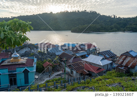 Bajo fishermen village of Pulau Papan Malenge Sulawesi Indonesia at sunset Bajo fishermen village of Pulau Papan Malenge Sulawesi Indonesia at sunset 139321607