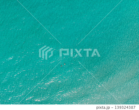 Aerial view of coral reefs and clear turquoise sea water in the Eastern Sea of Thailand. Aerial view of coral reefs and clear turquoise sea water in the Eastern Sea of Thailand. 139324387