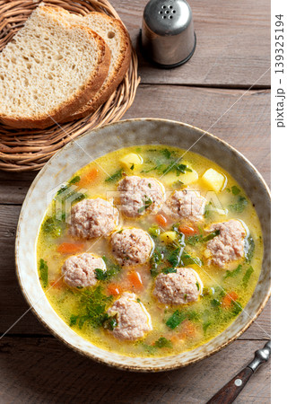 Homemade meatball soup 139325194