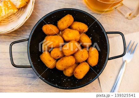 Potato croquettes - mashed potatoes balls breaded and deep fried, served with sauce Potato croquettes - mashed potatoes balls breaded and deep fried, served with sauce 139325541
