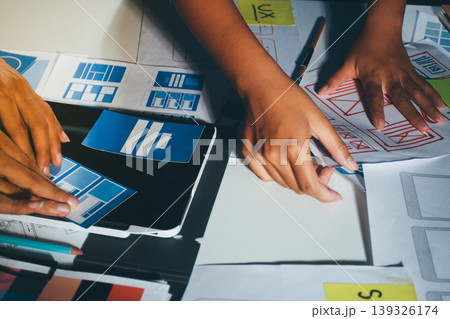 UXUI design brainstorming session with sketches and digital tools 139326174
