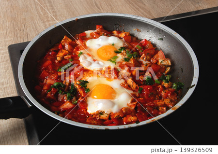 Homemade Shakshuka in Pan with Eggs and Vegetables Homemade Shakshuka in Pan with Eggs and Vegetables 139326509