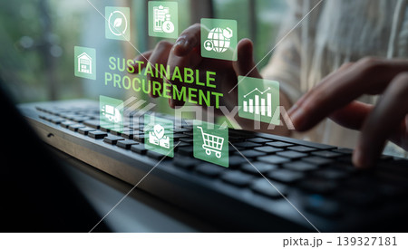 Detailed View of Hands Typing on Keyboard with Icons Representing Sustainable Procurement in a Modern Office Setting Ledger 139327181