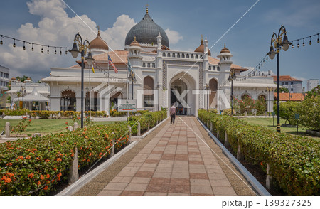 George Town Malaysia-April 15 2024:The Kapitan Keling Mosque is a mosque built in the 19th century by Indian Muslim traders in George Town, Penang, Malaysia. George Town Malaysia-April 15 2024:The Kapitan Keling Mosque is a mosque built in the 19th century by Indian Muslim traders in George Town, Penang, Malaysia. 139327325