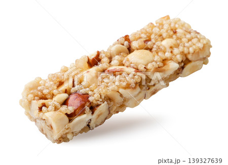Cereal bar with nuts close up on a white. Isolated Cereal bar with nuts close up on a white. Isolated 139327639