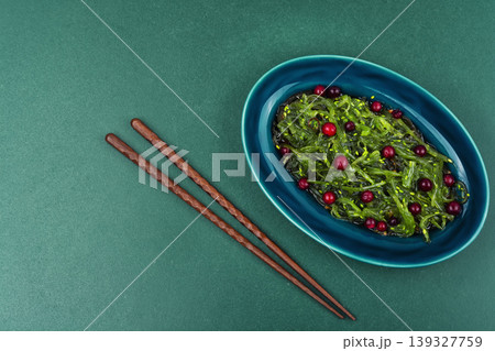Green Seaweed Salad with Cranberries, Asian Style Dish Green Seaweed Salad with Cranberries, Asian Style Dish 139327759