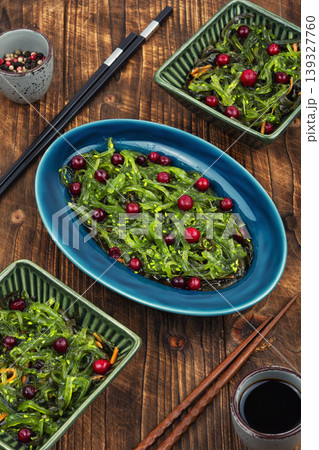 Seaweed superfood salad with cranberries and greens. 139327760
