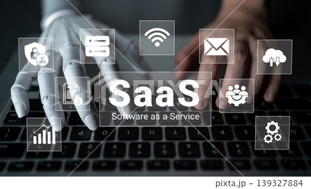 Futuristic Concept of Software as a Service with Robotic Hand Interacting with Laptop Combining Technology and Innovation in Digital Solutions Ledger Futuristic Concept of Software as a Service with Robotic Hand Interacting with Laptop Combining Technology and Innovation in Digital Solutions Ledger 139327884