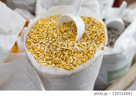 Large bag of dry corn for sale in grocery store Large bag of dry corn for sale in grocery store 139328861