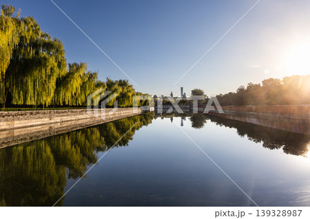 Scenic moat that surrounds Forbidden City in Beijing during sunrise. Scenic moat that surrounds Forbidden City in Beijing during sunrise. 139328987