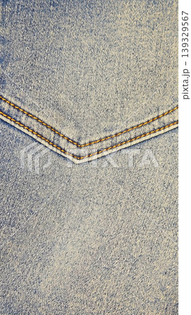 Close-up of stonewashed jeans fabric 139329567