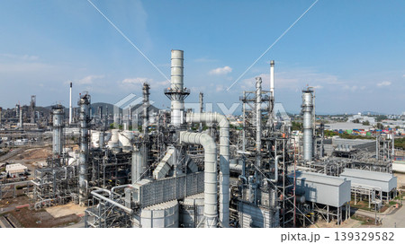Oil storage tank with oil refinery plant background, Global business power and energy chemical barrel, Oil refinery factory oil storage tank, Petrochemical industrial with blue sky. Oil storage tank with oil refinery plant background, Global business power and energy chemical barrel, Oil refinery factory oil storage tank, Petrochemical industrial with blue sky. 139329582
