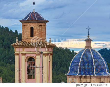 Bell tower and dome of a spanish church Bell tower and dome of a spanish church 139330083