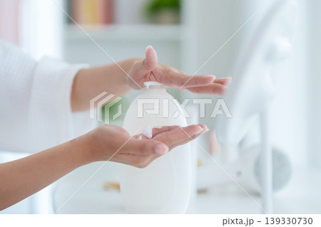 Asian women hands pump liquid soap dispenser wash clean hygiene routine morning bathroom home wellness skincare health antibacterial sanitizer prevention Asian women hands pump liquid soap dispenser wash clean hygiene routine morning bathroom home wellness skincare health antibacterial sanitizer prevention 139330730