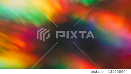 Bright blur leak. Colorful flare. Neon luminosity mixing reflection. Red green yellow optical lens spectrum on black abstract background. Bright blur leak. Colorful flare. Neon luminosity mixing reflection. Red green yellow optical lens spectrum on black abstract background. 139330944