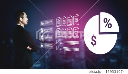 Businessman Analyzing Financial Data and Charts with Documents and Percentage Symbols Against a City Night Background Ledger 139331074
