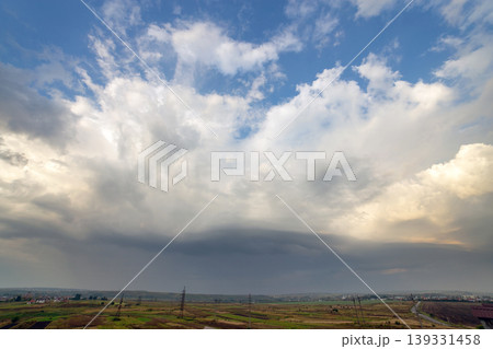 Blue sky covered with white puffy clouds. Blue sky covered with white puffy clouds. 139331458