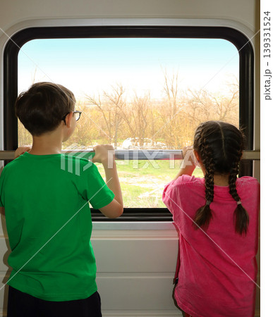 children on train station platform and traveling 139331524