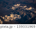 Aerial view of mountain landscape at sunset from airplane window 139331969