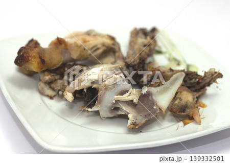 chicken bones and leftovers chicken bones and leftovers 139332501