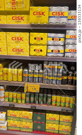 Different flavors of Maltese iconic beer Cisk cans on shelves 139333134