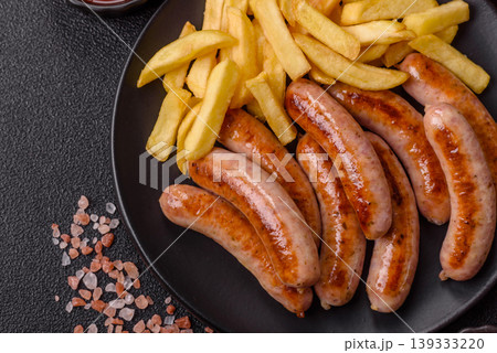 Grilled or barbecued chicken sausages for the dinner table. Grilled sausages 139333220