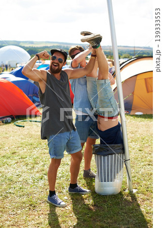 Outdoor, trash or drunk friends in festival together for vacation or social event in summer. Music concert, funny party games or crazy people with freedom, smile or bin joke in holiday celebration Outdoor, trash or drunk friends in festival together for vacation or social event in summer. Music concert, funny party games or crazy people with freedom, smile or bin joke in holiday celebration 139333553