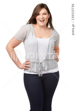 Confidence, portrait and plus size woman with smile, casual fashion and isolated on white background. Self love, body positivity and happy model with natural beauty, wellness and inclusion in studio. Confidence, portrait and plus size woman with smile, casual fashion and isolated on white background. Self love, body positivity and happy model with natural beauty, wellness and inclusion in studio. 139333736