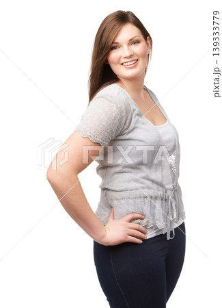 Confidence, portrait and plus size model with smile, casual fashion and isolated on white background. Pride, body positivity and happy woman with natural beauty, wellness and inclusion in studio. Confidence, portrait and plus size model with smile, casual fashion and isolated on white background. Pride, body positivity and happy woman with natural beauty, wellness and inclusion in studio. 139333779