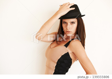 Woman, vintage fashion and confidence in portrait, wall background and pride for cool clothing. Female person, style and hat or face by backdrop, retro and creative outfit or beauty and cosmetics Woman, vintage fashion and confidence in portrait, wall background and pride for cool clothing. Female person, style and hat or face by backdrop, retro and creative outfit or beauty and cosmetics 139333806