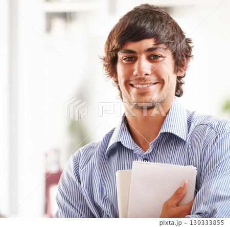 Businessman, portrait and happy with notebook in office, confident and career pride for startup. Entrepreneur, smile or face of creative writer for job ambition, planning or relax wellness in company Businessman, portrait and happy with notebook in office, confident and career pride for startup. Entrepreneur, smile or face of creative writer for job ambition, planning or relax wellness in company 139333855