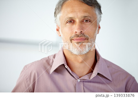 Smile, portrait and mature businessman in the office with positive, good and confident attitude. Happy, career and face of professional male lawyer from Mexico with legal career in modern workplace. 139333876
