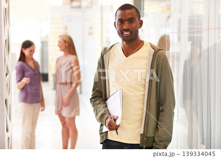 Business, man and portrait with happy in office for collaboration, planning and research at workplace. Person, face or employee and teamwork for strategy, entrepreneur and smile for career at work 139334045