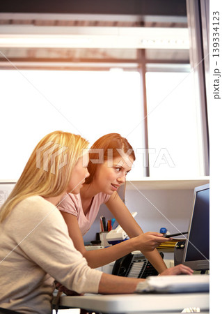 Business, training and women with computer in office for feedback, review or learning, support or advice. Corporate, coaching and woman mentor online with colleague for market research and analysis Business, training and women with computer in office for feedback, review or learning, support or advice. Corporate, coaching and woman mentor online with colleague for market research and analysis 139334123