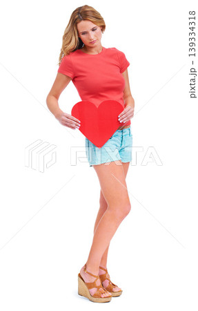 Woman, sad and valentines day heart in studio for relationship break up, romance fail or white background. Female person, unhappy and mockup space for love emoji icon, lonely symbol and depressed Woman, sad and valentines day heart in studio for relationship break up, romance fail or white background. Female person, unhappy and mockup space for love emoji icon, lonely symbol and depressed 139334318