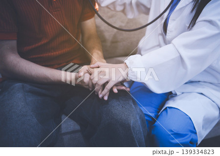 Doctor using a stethoscope checking patient with examining, presenting results symptom and recommend treatment method, Healthcare and medical concept Doctor using a stethoscope checking patient with examining, presenting results symptom and recommend treatment method, Healthcare and medical concept 139334823