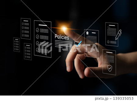 Hand Reaching Towards Digital Policies and Documents with Checkmarks and Icons for Data Management and Compliance in a Tech Environment Cyphers. Hand Reaching Towards Digital Policies and Documents with Checkmarks and Icons for Data Management and Compliance in a Tech Environment Cyphers. 139335053